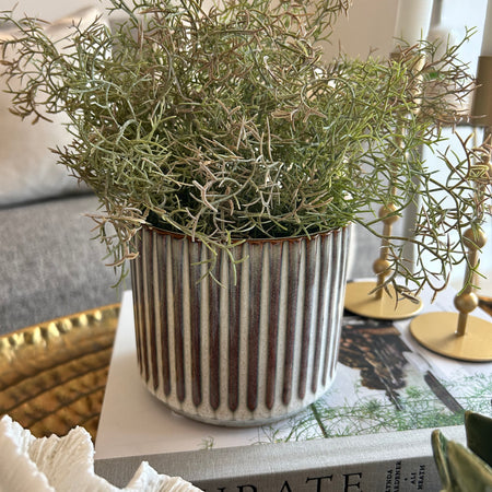 Reactive glaze ribbed plant pot