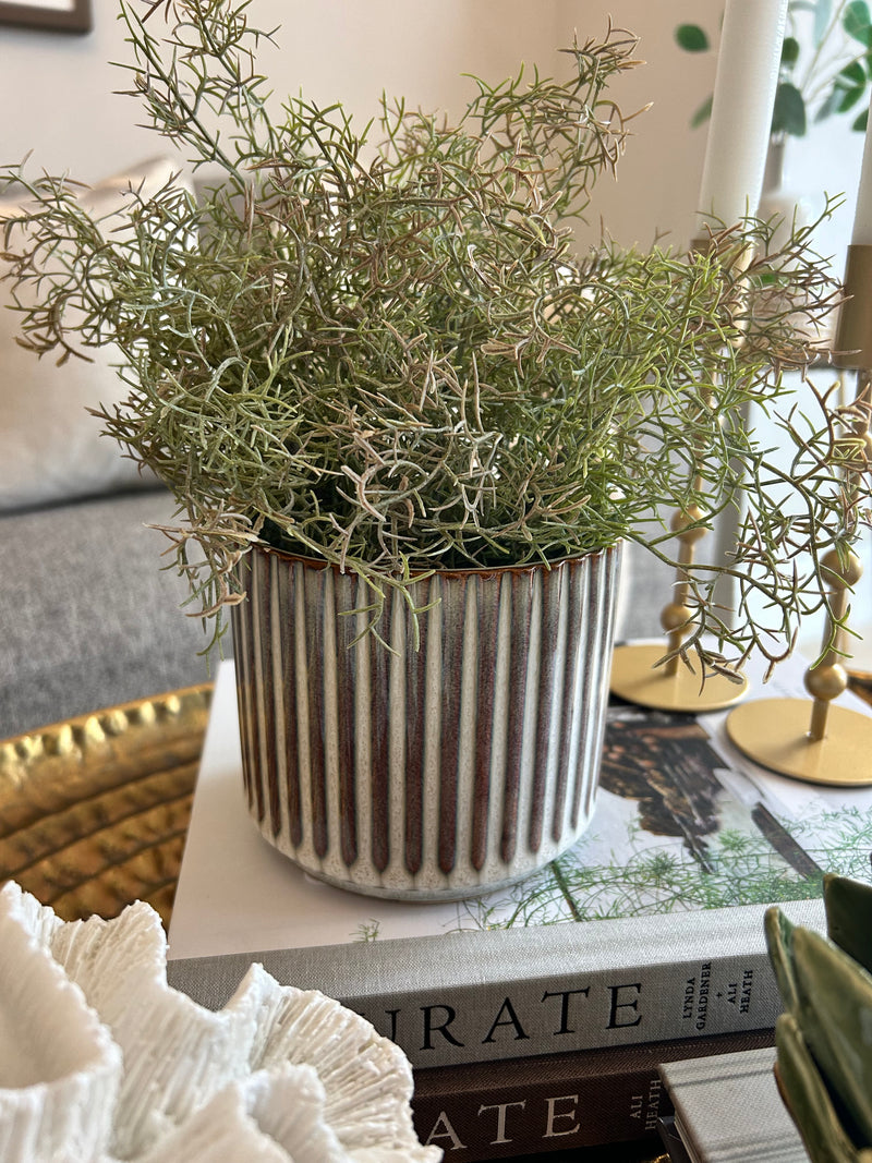 Reactive glaze ribbed plant pot