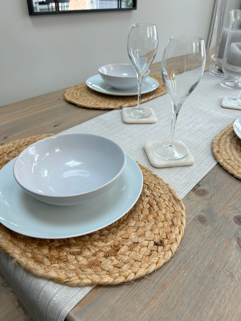 Set of four seagrass woven oval placemats