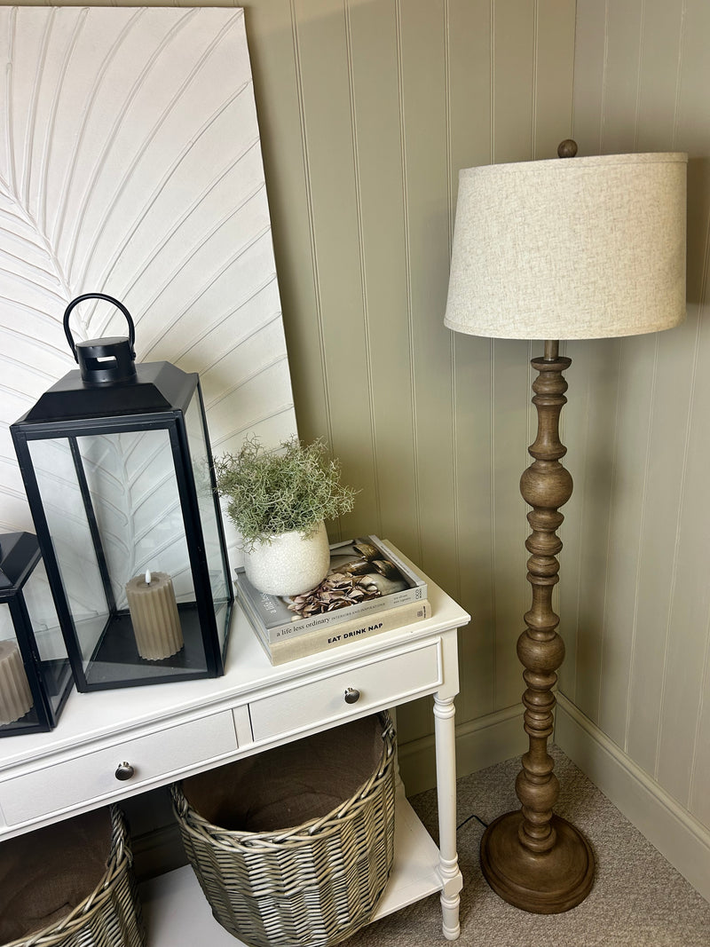 Wooden shaped floor lamp with linen shade