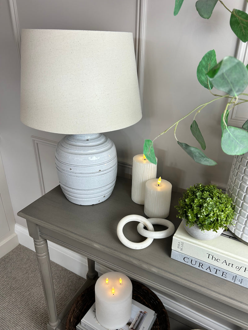 Thalia stone distressed lamp with linen shade
