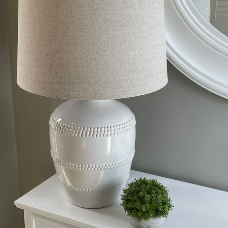 Off White beaded bobble ceramic lamp with linen shade