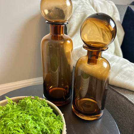 Amber glass ball top bottle