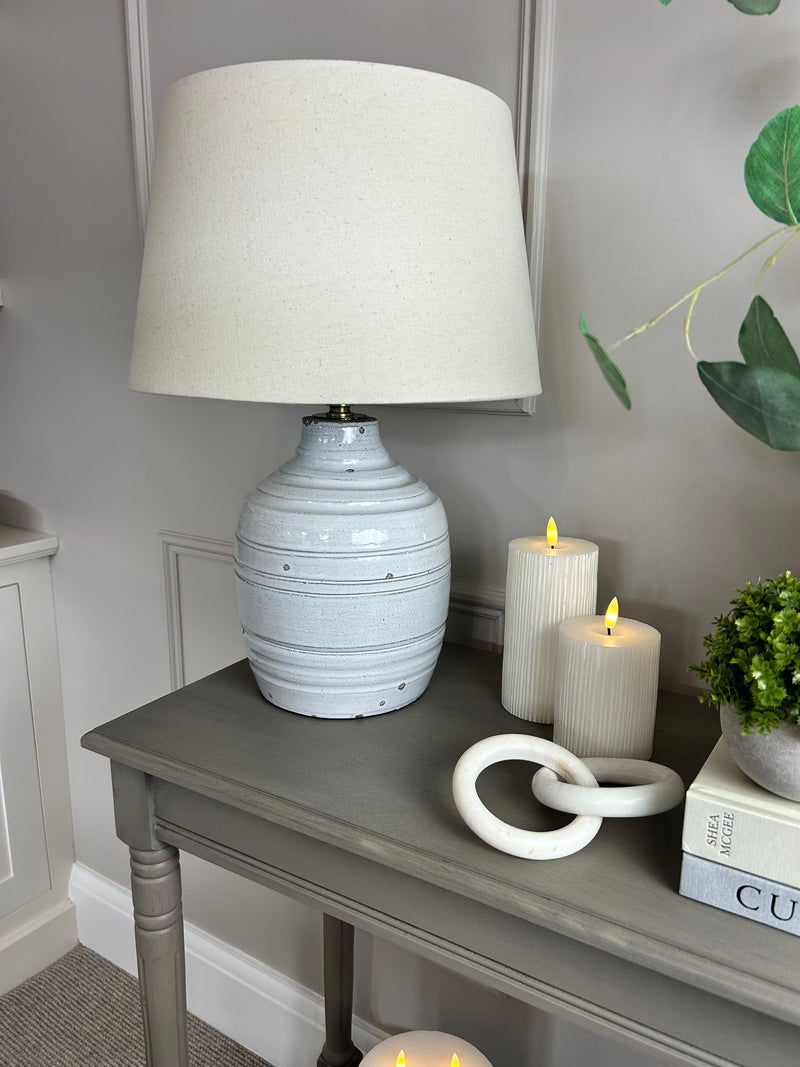 Thalia stone distressed lamp with linen shade
