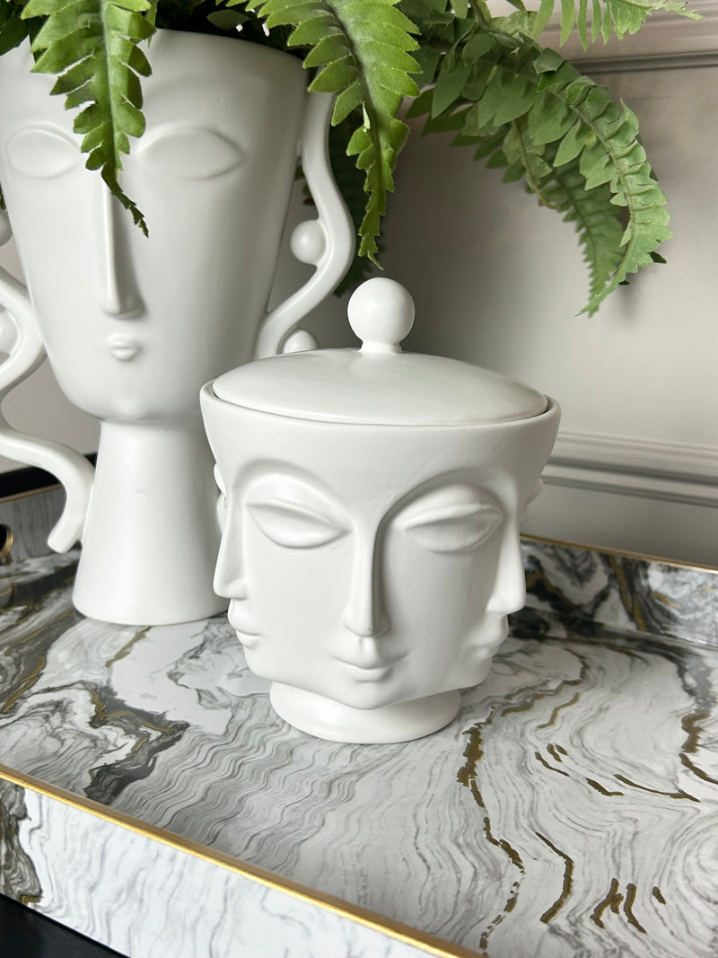 White faces ceramic lidded jar