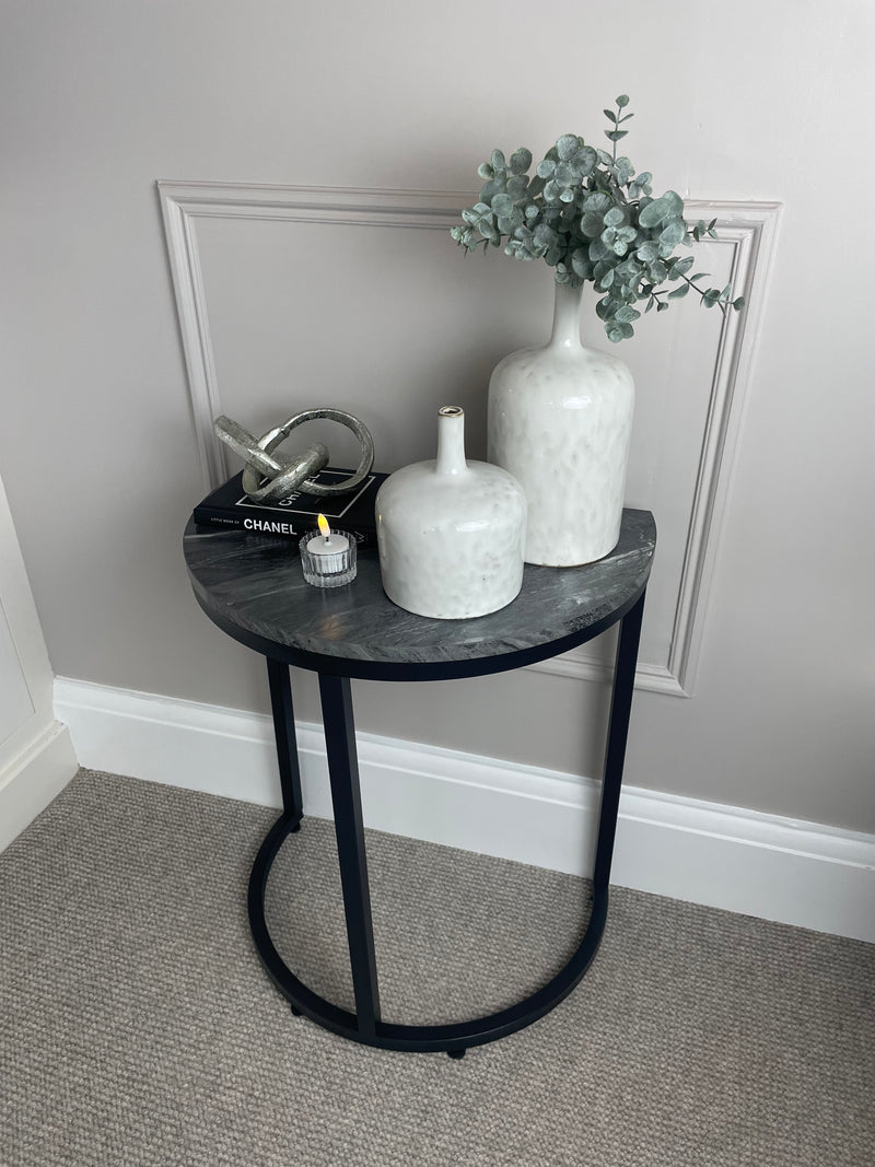 Black marble look top half moon table