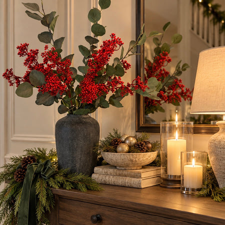 Festive Lush eucalyptus with red berry arrangement
