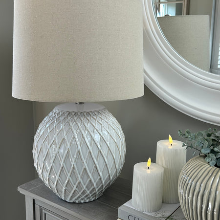 Lattice textured ceramic lamp with linen shade