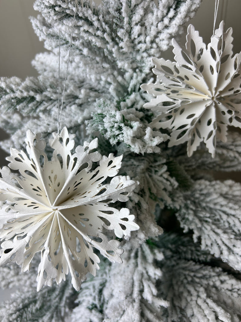 Set of 9 boxed paper cut out snowflakes stars