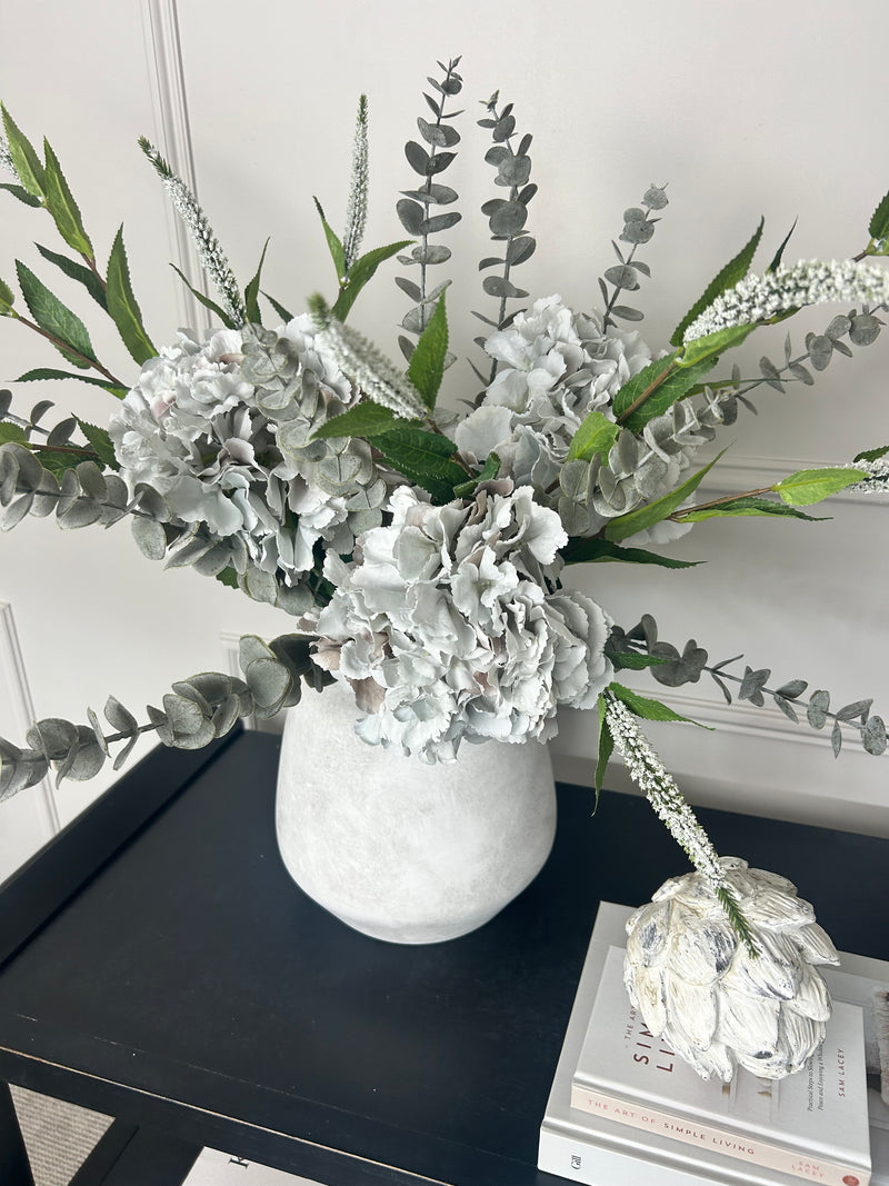 Bouquet arrangement grey/taupe hydrangeas white Veronica eucalyptus bunch.