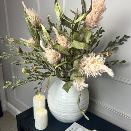 Green tall reed, green sorghum grass and mocha oyster alexis stem arrangement