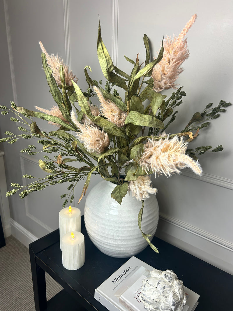 Green tall reed, green sorghum grass and mocha oyster alexis stem arrangement