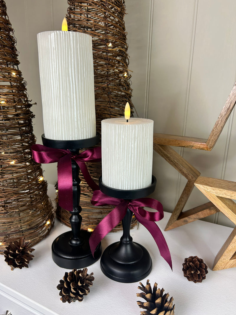 Set of Two Tall staggered height Black Metal Candlesticks 23cm