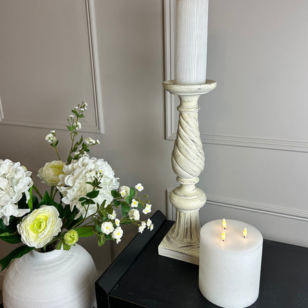 Pair of cream large twisted candle sticks
