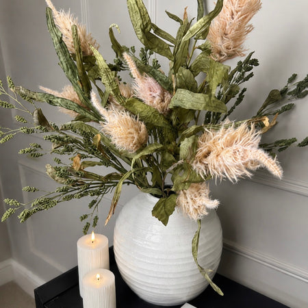 Green tall reed, green sorghum grass and mocha oyster alexis stem arrangement