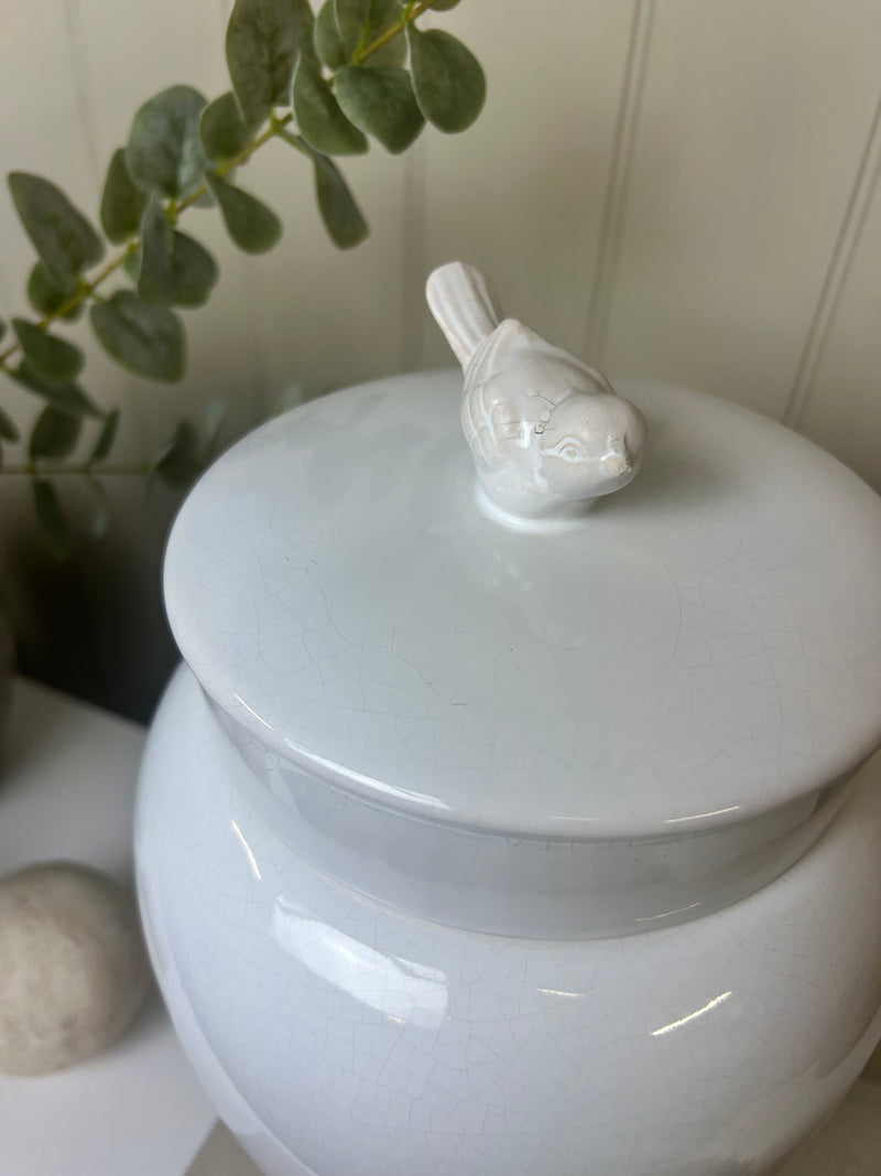 White ceramic bird topped ginger lidded jar