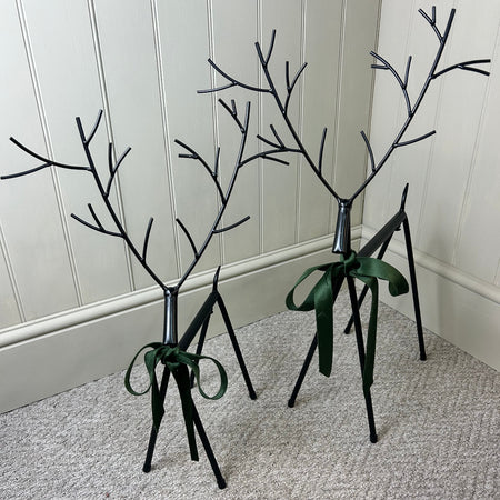 Set of two black metal reindeers 67cm