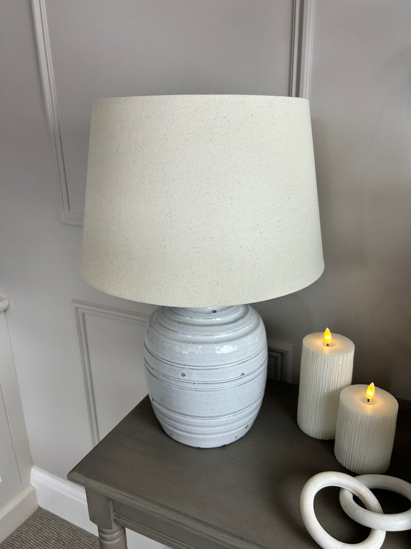 Thalia stone distressed lamp with linen shade