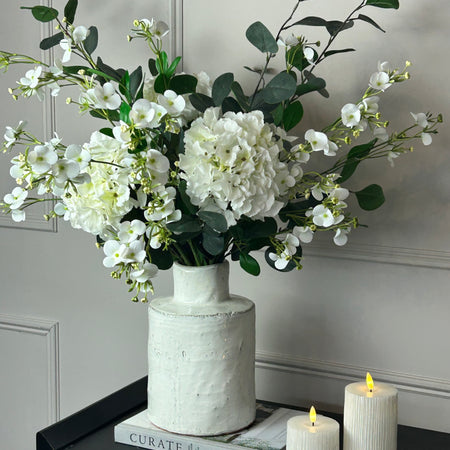 Eucalyptus, white hydrangeas and Florence spray stem arrangement
