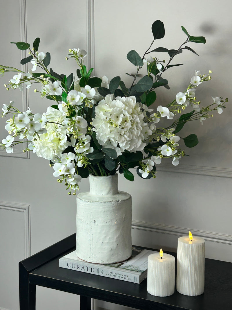 Eucalyptus, white hydrangeas and Florence spray stem arrangement