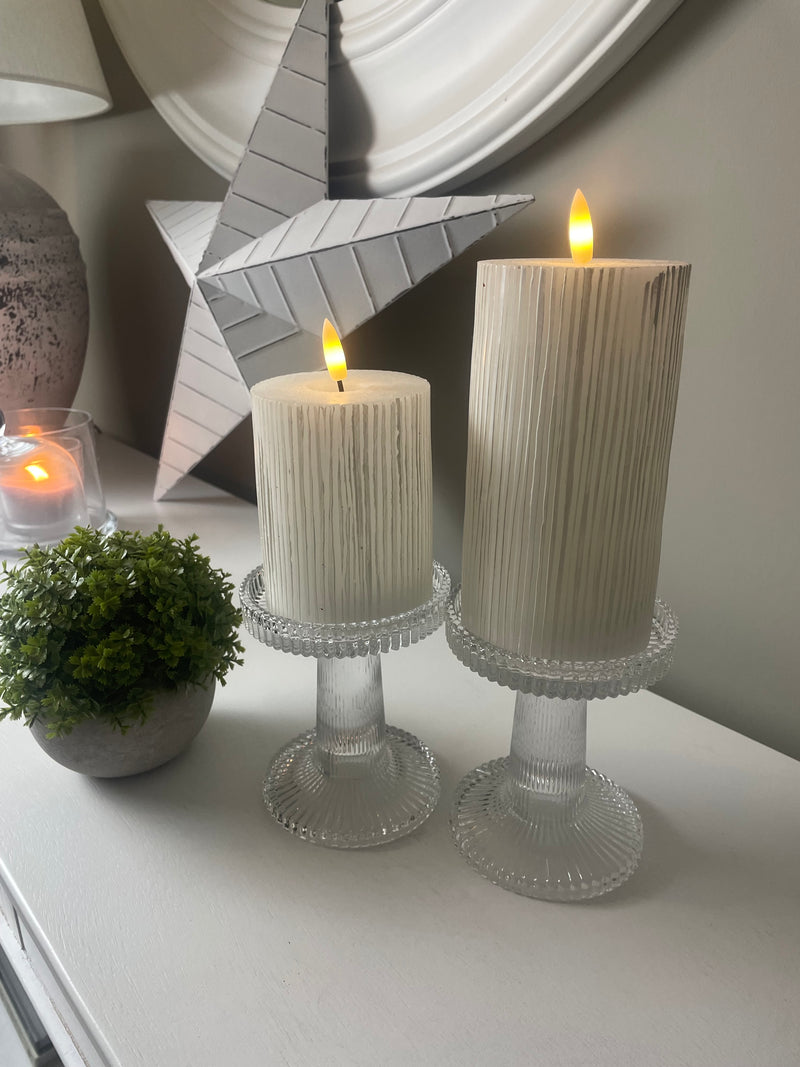 Pair of ribbed glass candle sticks holders