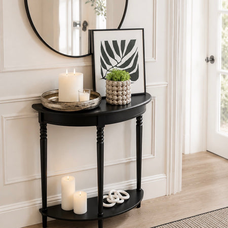 Black half moon table with turned legs