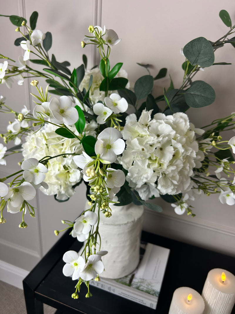 Eucalyptus, white hydrangeas and Florence spray stem arrangement