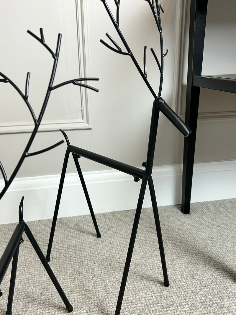 Set of two black metal reindeers 67cm
