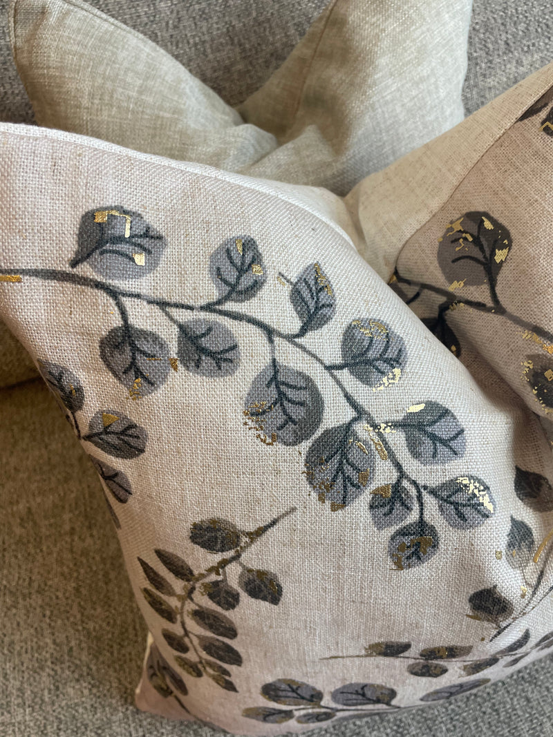 Gold leaf detail luxe cushion