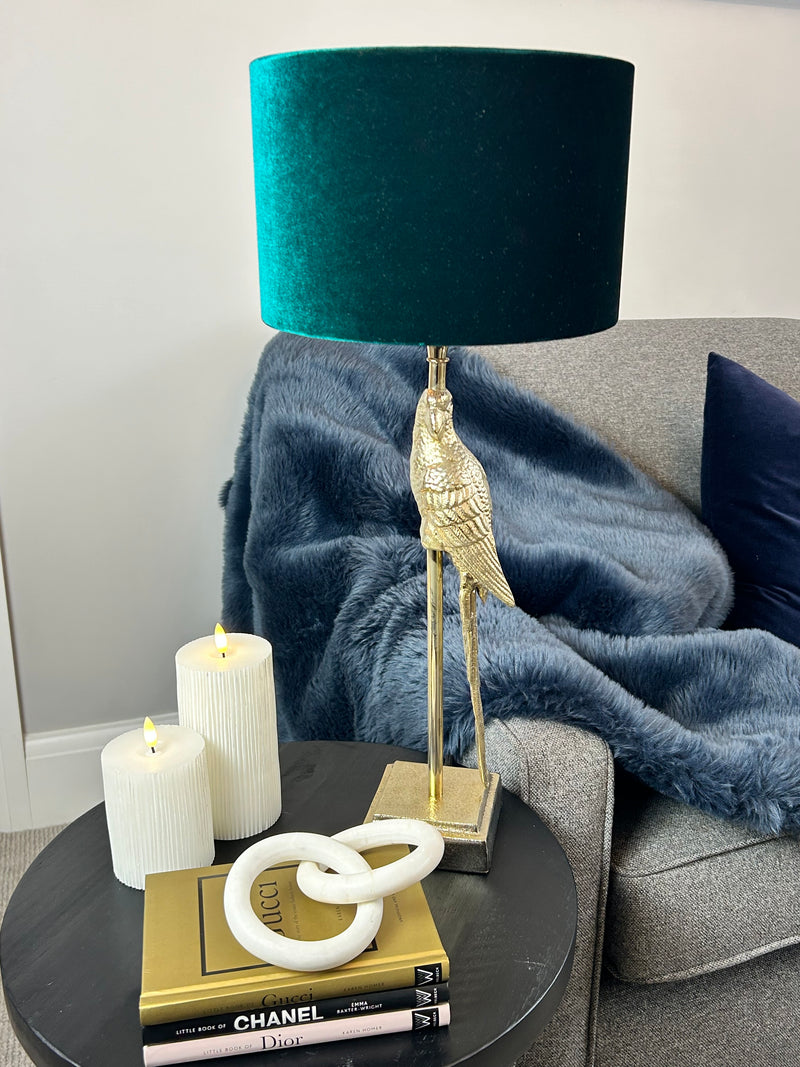Gold parrot lamp with emerald green shade
