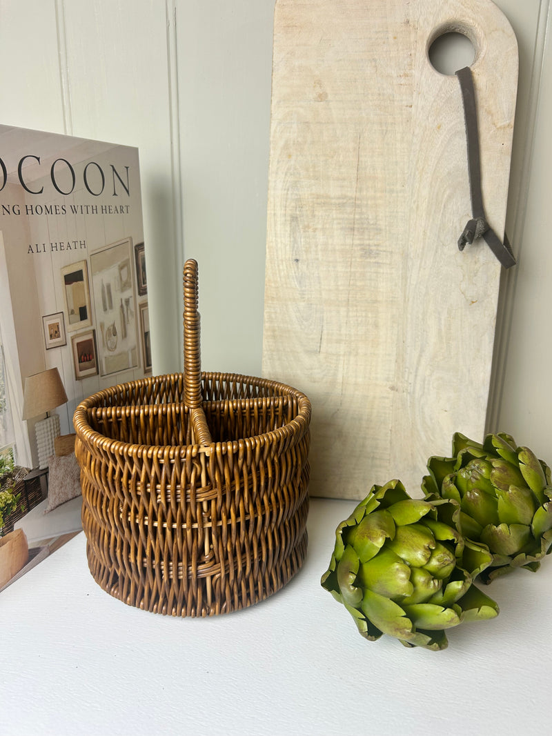 Dark wicker woven utensils holder