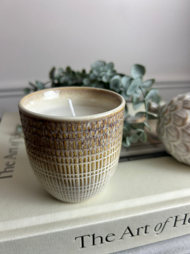 Brown filled ceramic candle
