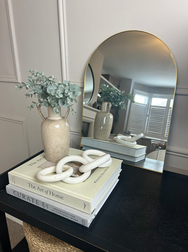 Gold arched metal mirror 50x30