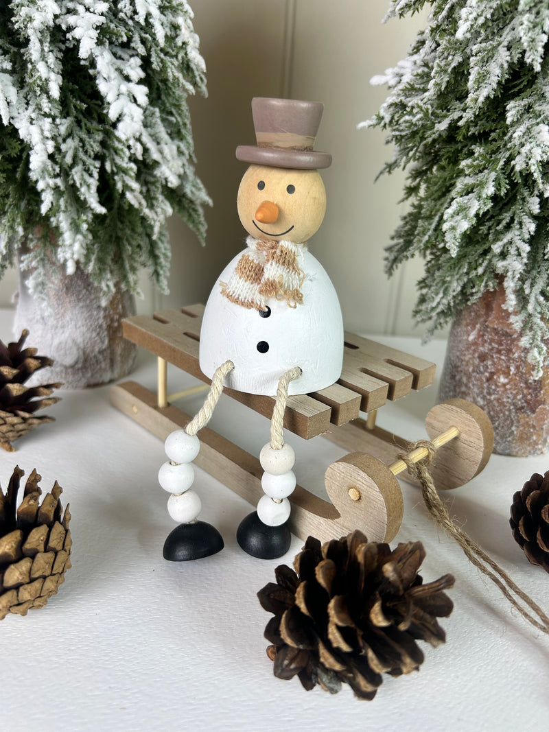 Sitting metal snowman 11cm