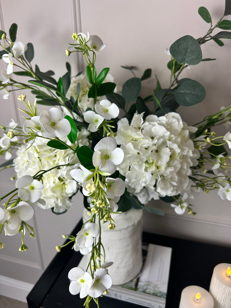 Eucalyptus, white hydrangeas and Florence spray stem arrangement