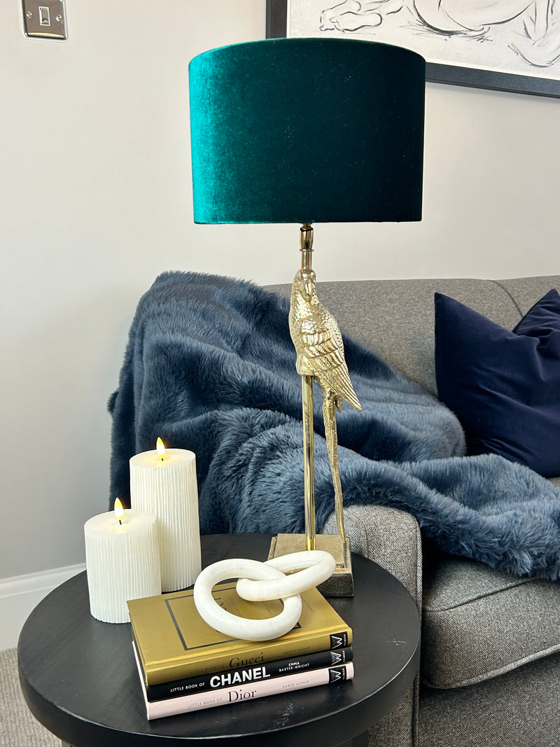 Gold parrot lamp with emerald green shade