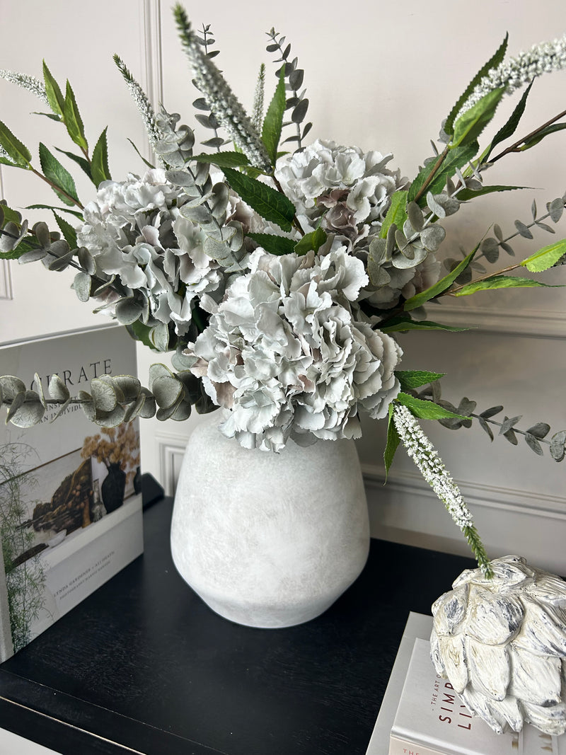 Bouquet arrangement grey/taupe hydrangeas white Veronica eucalyptus bunch.