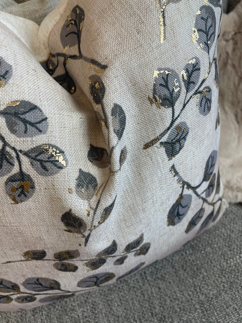 Gold leaf detail luxe cushion
