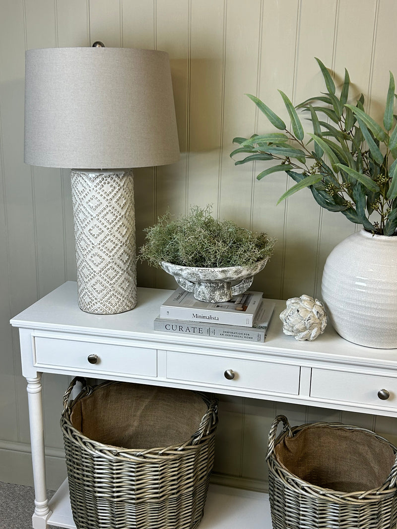 Round rustic stone bowl on foot base