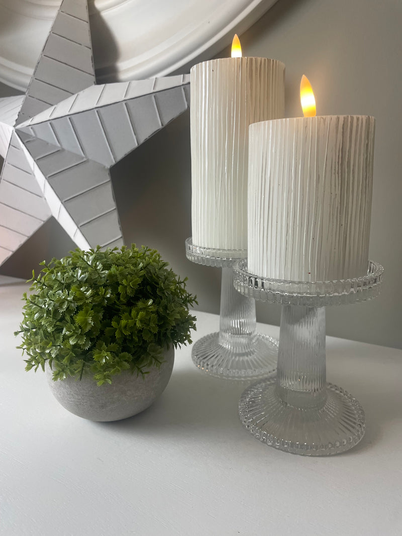 Pair of ribbed glass candle sticks holders