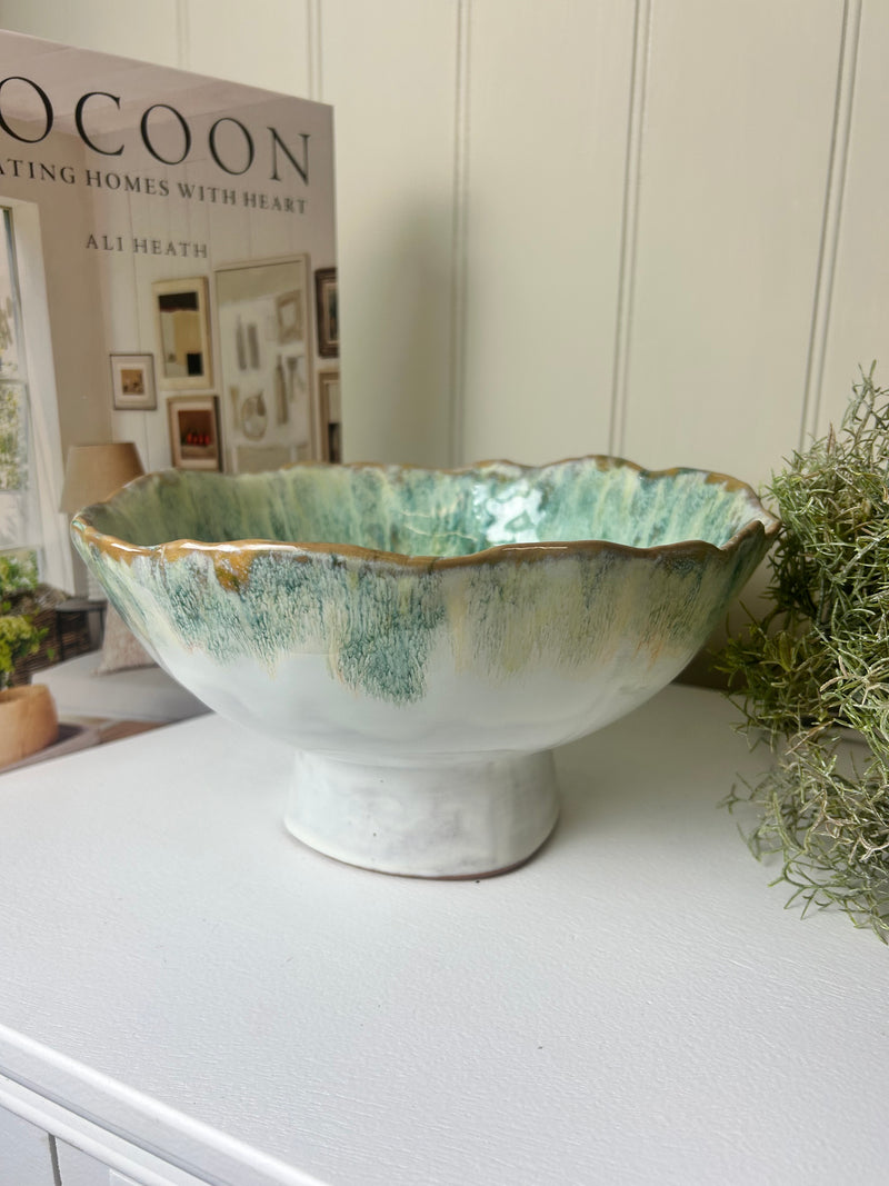 Green decorative ombré bowl on foot stand