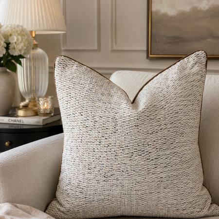 Neutral nicco textured cushion with trim 56cm
