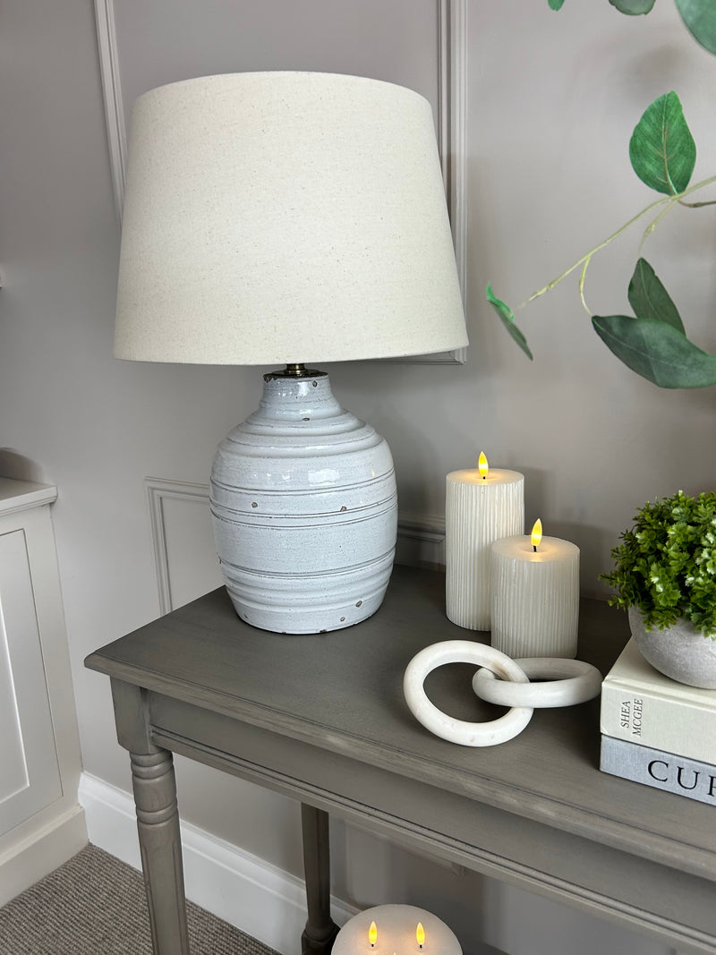 Thalia stone distressed lamp with linen shade