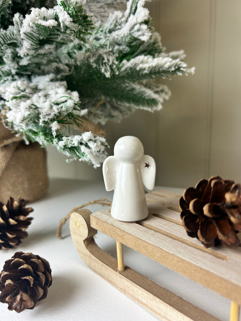 Ceramic angel with Gold Star wing 6cm