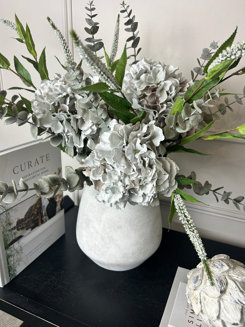 Bouquet arrangement grey/taupe hydrangeas white Veronica eucalyptus bunch.