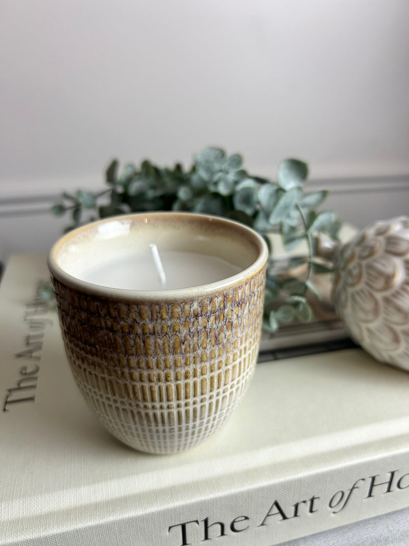 Brown filled ceramic candle