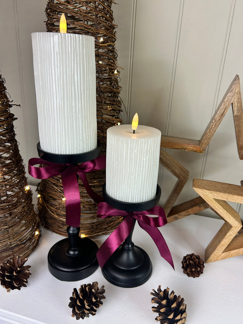 Set of Two Tall staggered height Black Metal Candlesticks 23cm