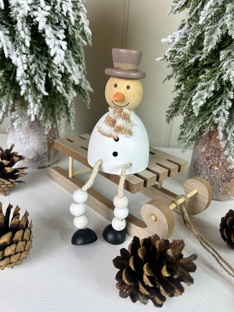 Sitting metal snowman 11cm