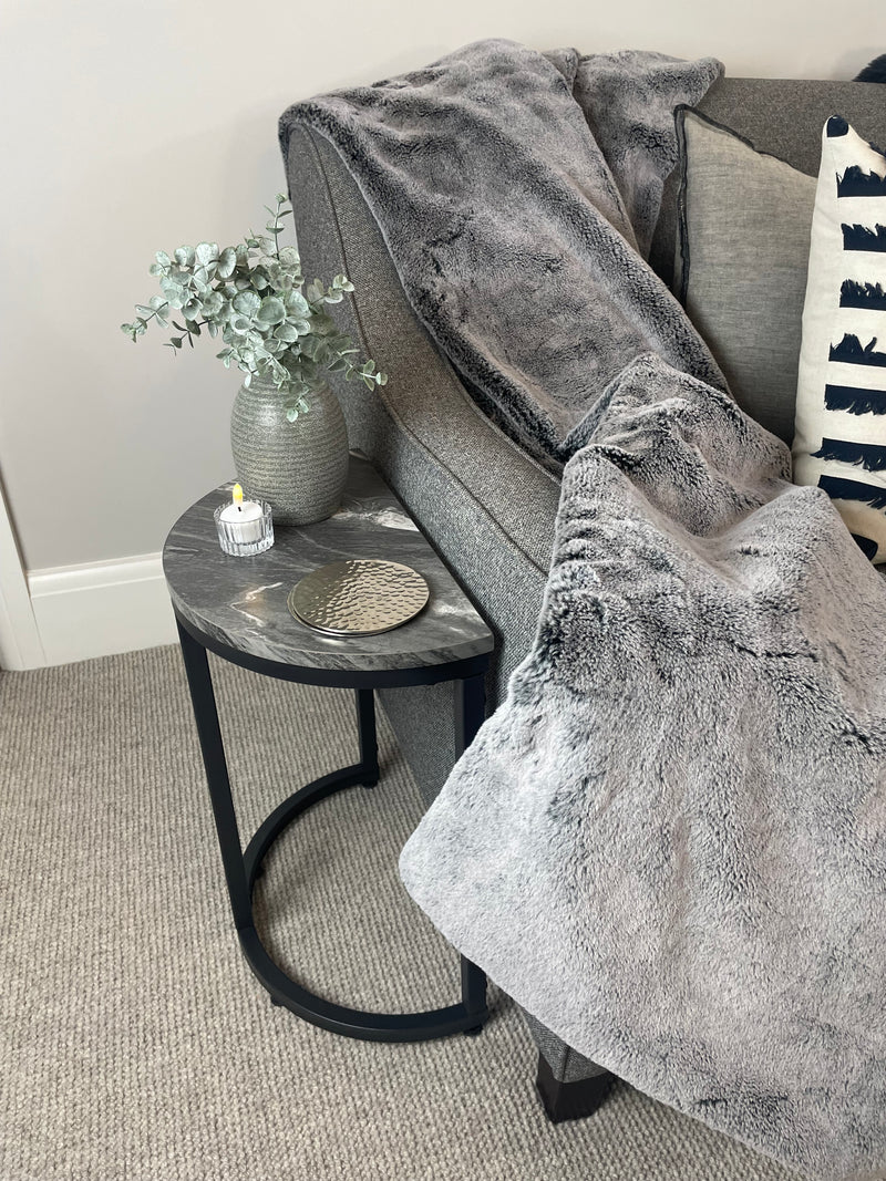 Black marble look top half moon table