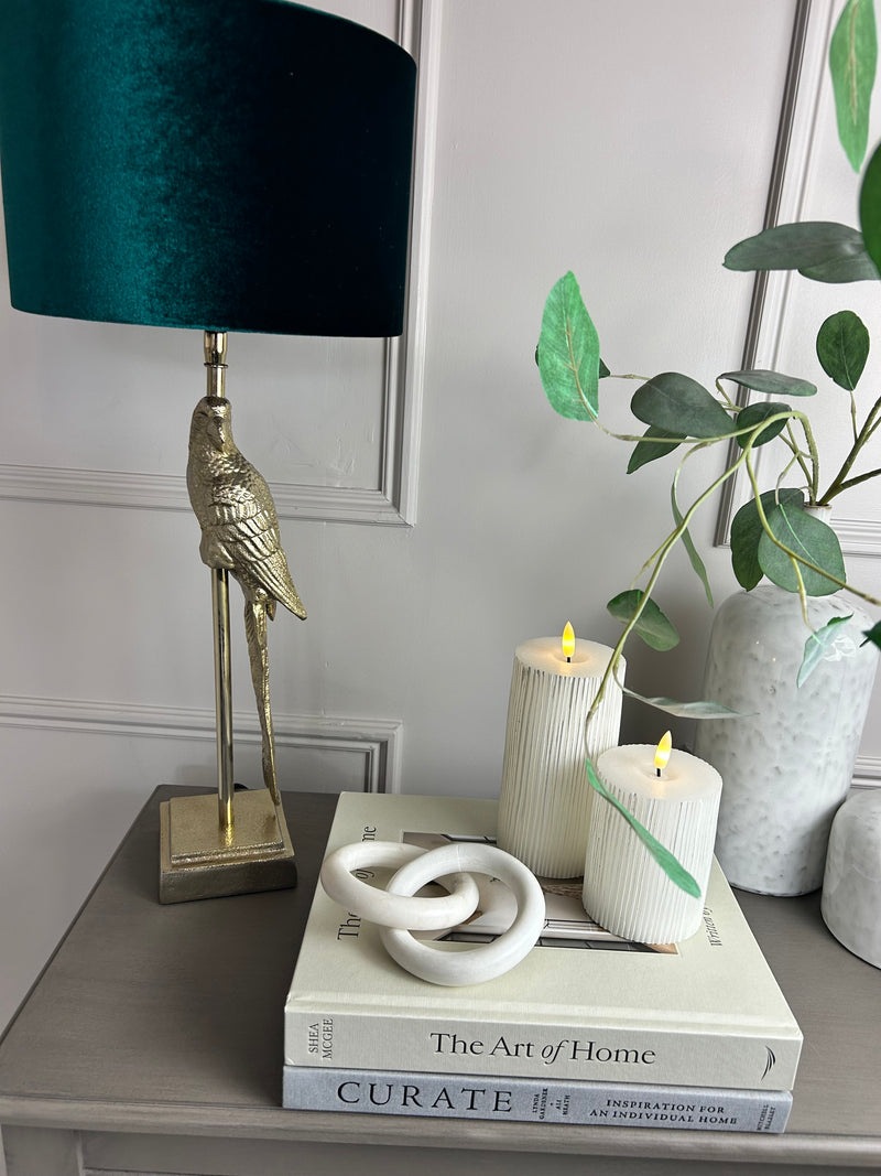 Gold parrot lamp with emerald green shade